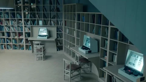 In the library where you can find information by scrolling on the display  Stock Footage 287946760