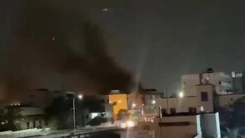Libya: Clashes Over Match Spark Blaze in Libyan Capital Stock Footage 334921700