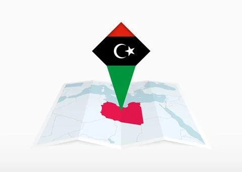 Libya is depicted on a folded paper map and pinned location marker with fla.. Stock Illustration