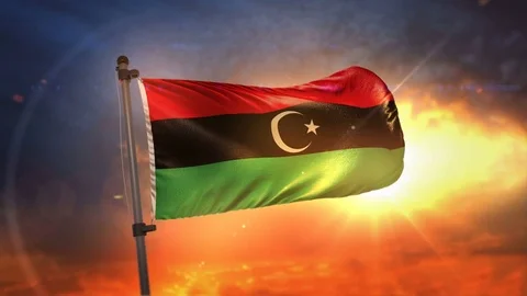 Libya Flag Backlit At Beautiful Sunrise Loop Slow Motion 4K Stock Footage 76566939