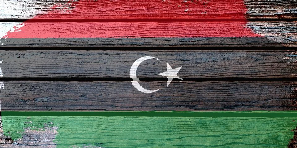 Libya flag - realistic looking flag on a wooden surface Stock Illustration