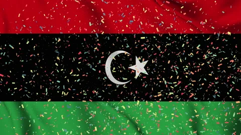 Libya flag seamless animation with paper confetti Stock Footage 223329936