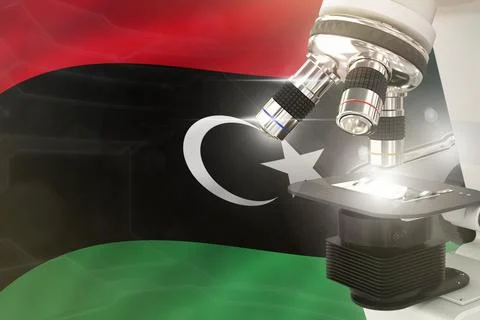 Libya science development concept - microscope on flag background Stock Illustration