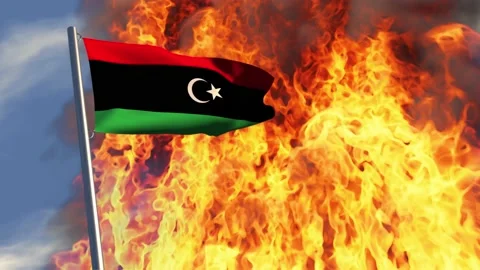 Libyan flag with flames in the background Stock Footage 182604499