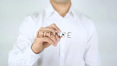 License, Man Writing on Glass Stock Footage