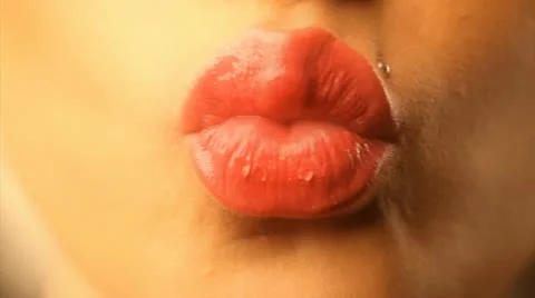 Licking her red lips close-up Stock Footage 10584093