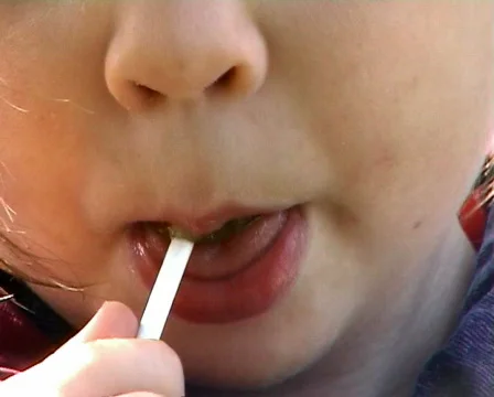 Licking Lollipop 스톡 동영상 564895