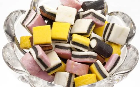 Licorice candy bowl Stock Photos