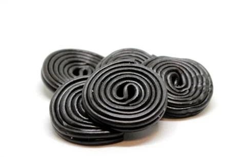 Licorice wheels Stock Photos