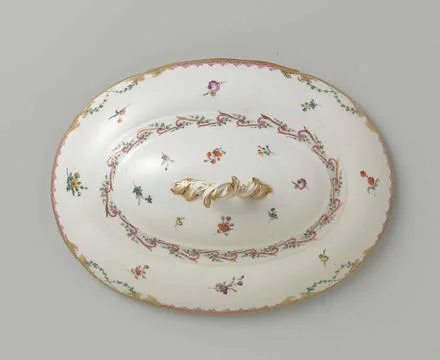 Lid with button, oval of shape, belonging to a tableware with swapped ribb... Stock Photos