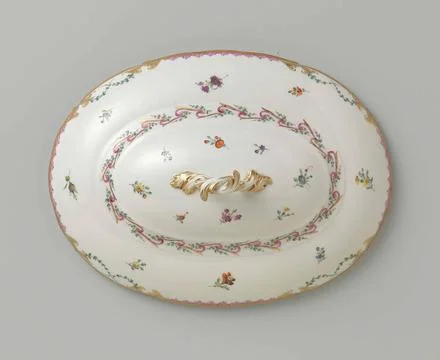 Lid with button, oval of shape, belonging to a tableware with swapped ribb... Stock Photos