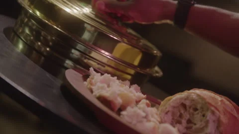 Lid of Communion Elements Being Removed Stockbeeldmateriaal 208801968