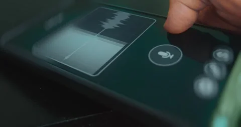 Lie detector app on smartphone recording the voice, result is Truth Stock Footage 313621732