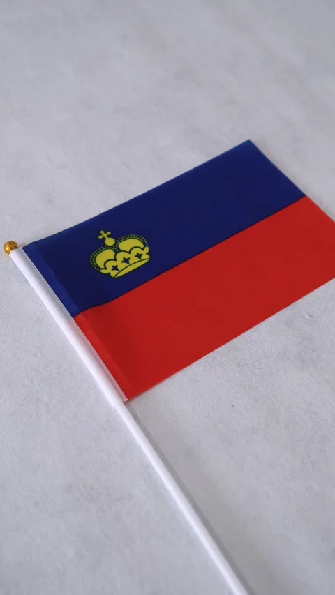 Liechtenstein flag on white background. Vertical video. Liechtensteiner Stock Footage 331053315