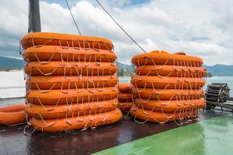 Life buoy stack on ship or boat for security and safety concept background Foto stock