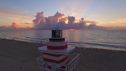 Life guard post in the sand of Miami beach at Sunrise, view of Beach and ocean Stock Footage 100856294