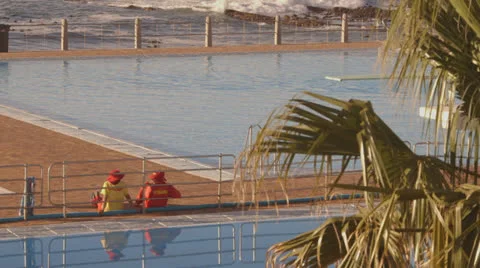 Life guards by pool Stock Footage 25850464