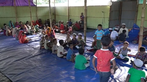 Life inside the Rohingya refugee camps at Cox's Bazar, Bangladesh Stock Footage 99940960