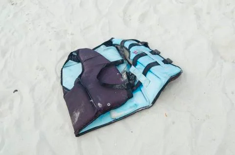 A life jacket on a beach Stock Photos