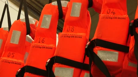 Life Jackets Hanging On The Row Stock Footage 63990690