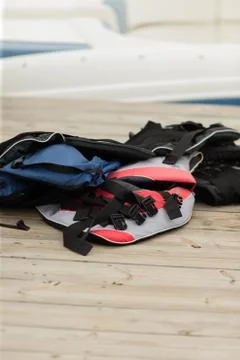 Life Jackets in a Pile on Dock Stock-Fotos