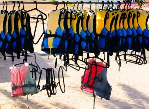 Life jackets on a rack Stock Photos