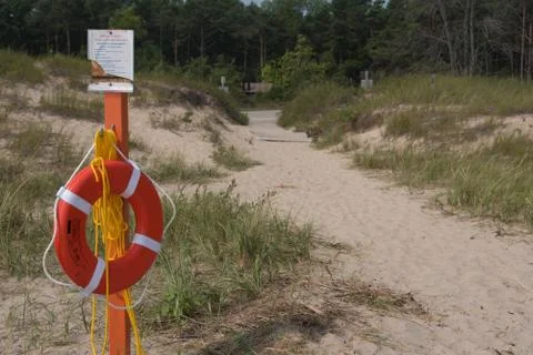 Life Ring on the Beach Stock Photos