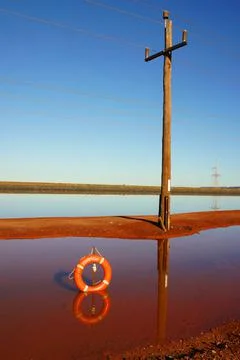 Life Ring in Desert Stock Photos