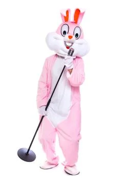 Life size stuffed easter bunny sings in retro microphone, celebrates easter Stock Photos