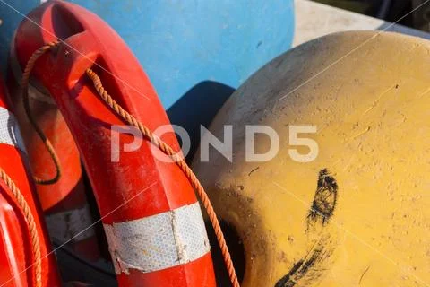 Lifebelt and buoys in colourful plastic Stock Photos
