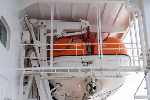 Lifeboat on the deck of a ship Stock Photos