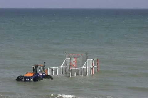 Lifeboat returns to amphibious launch tractor  Stock Footage 11900603