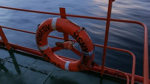 Lifebuoy and waves Stock Footage 107556180