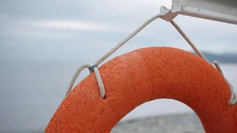 Lifebuoy hanging on the empty beach. Stock Footage 78487464