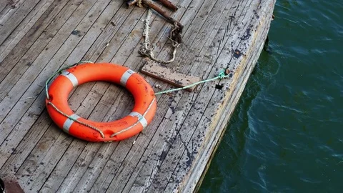 Lifebuoy on the pier Stock Footage 82993809
