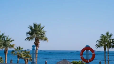 Lifebuoy at the pool. In the foreground is a pool, behind you can see the sea an Vídeo Stock 240201255