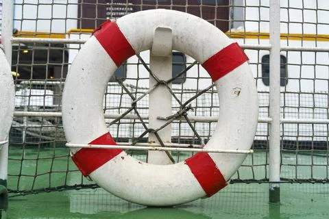 Lifebuoy Ring Attached to Ship Deck Safety Net Stock Photos