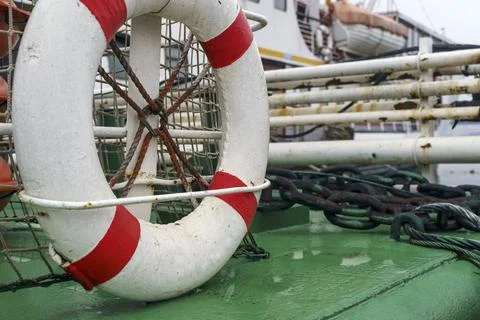 Lifebuoy Ring Attached to Ship Deck Safety Net Stock Photos