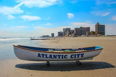 A lifeguard boat sits on a sandy beach in Atlantic City, New Jersey Fotos Stock
