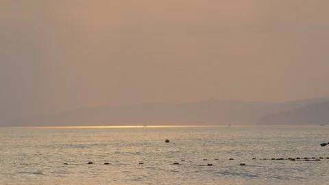 Lifeguard on the Boat at Sunset Stock Footage 89744761