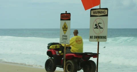 Lifeguard Drives on Beach Video stock 262115238