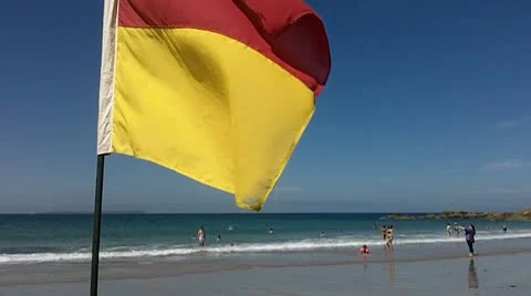 Lifeguard Flag in slow motion Stock Footage 8954761