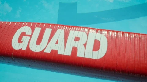 Lifeguard Float on the Surface of a Public Swimming Pool 스톡 동영상 114138463