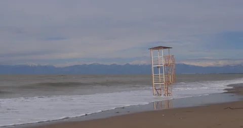 Lifeguard rescue tower on an empty beach Stock Footage 131079287