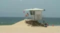 Lifeguard Tower and lifeguard on Huntington Beach HD Footage