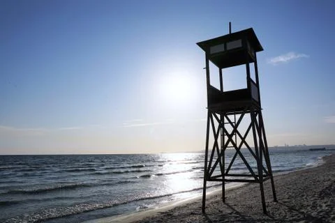Lifeguard tower on beach at daytime. Stock Photos