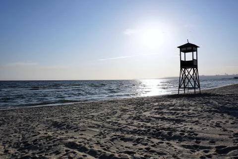 Lifeguard tower on beach at daytime. Stock Photos