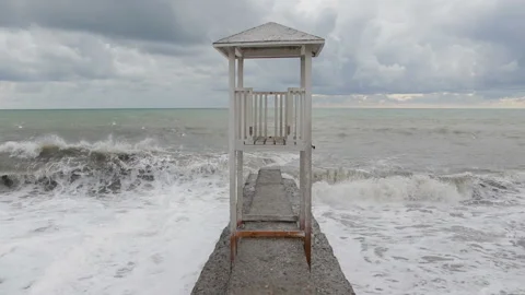 Lifeguard tower at empty waterfront beach in the off-season. Stock Footage 144741937