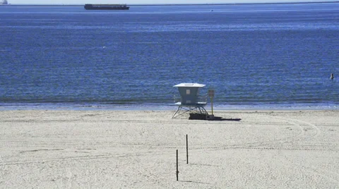 Lifeguard tower on a lonely beach Stock Footage 36301241