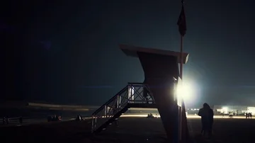 Lifeguard tower at the night with searchlight on the background. Dubai. UAE. Stock Footage 85536100